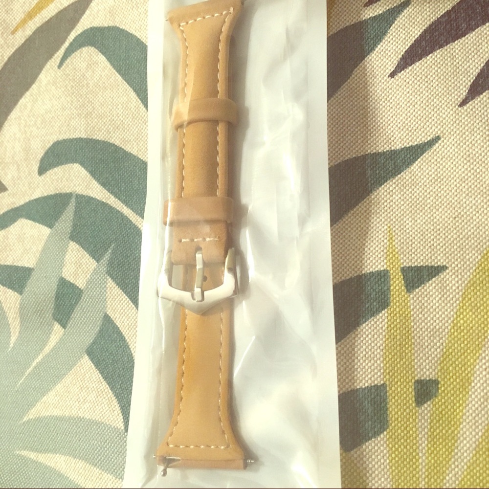 Tan leather Fitbit Versa band